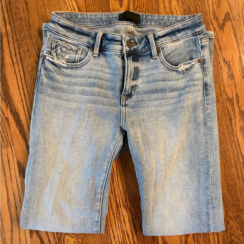 Buckle Black light wash skinny jeans
